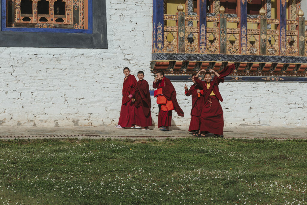 Young Bhutanese boys wearing traditional attire